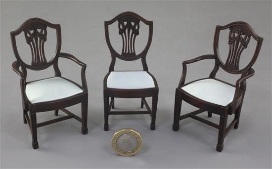 Denis Hillman. Three Hepplewhite style mahogany shield back miniature dining chairs, height 3.5in.